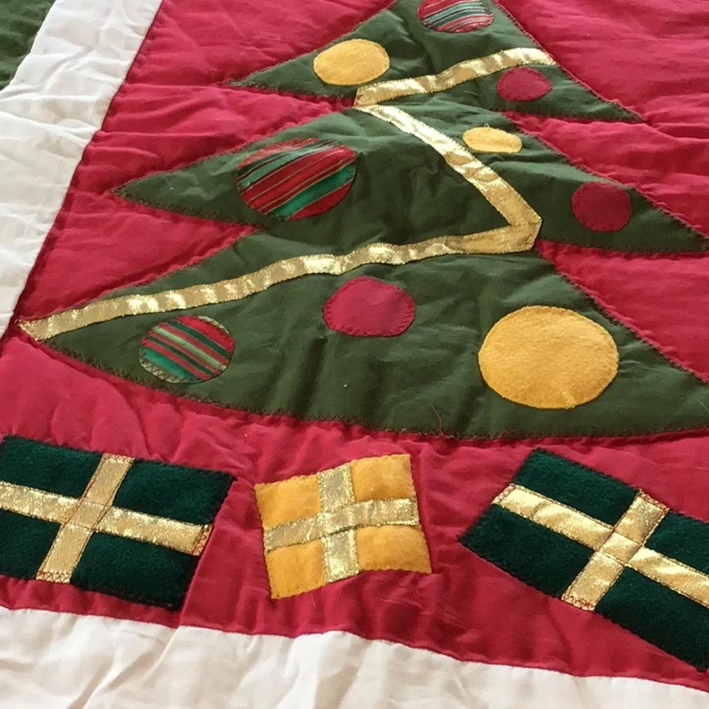 Handmade Christmas-themed applique quilt